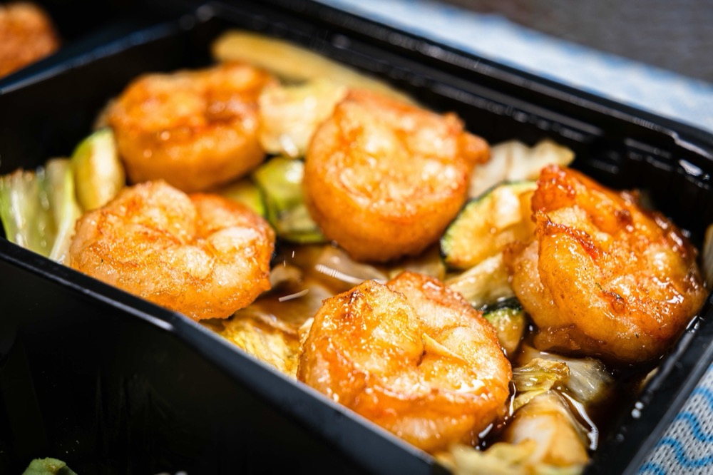Honey-glazed jumbo shrimp with napa cabbage in savory sauce